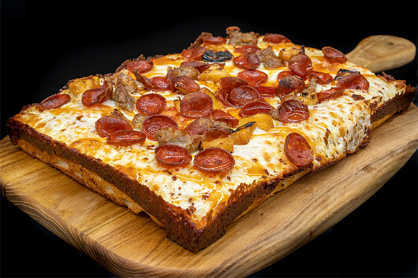 Detroit Style Pizza with pepperoni and pineapple for Barclay-Kingston, Cherry Hill group food orders.