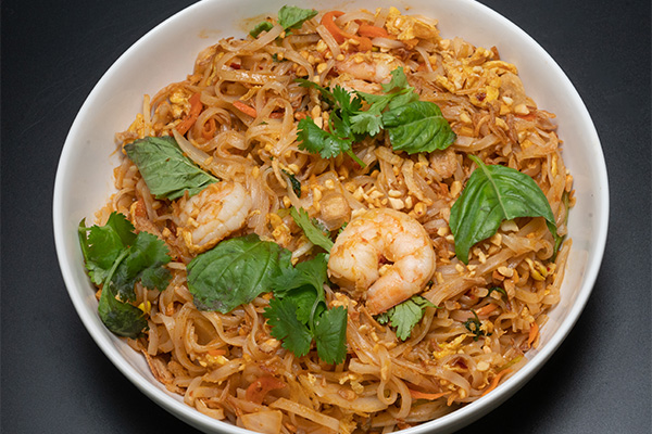 A bowl of Shrimp Pad Thai for group ordering near Cherry Hill Mall, New Jersey.